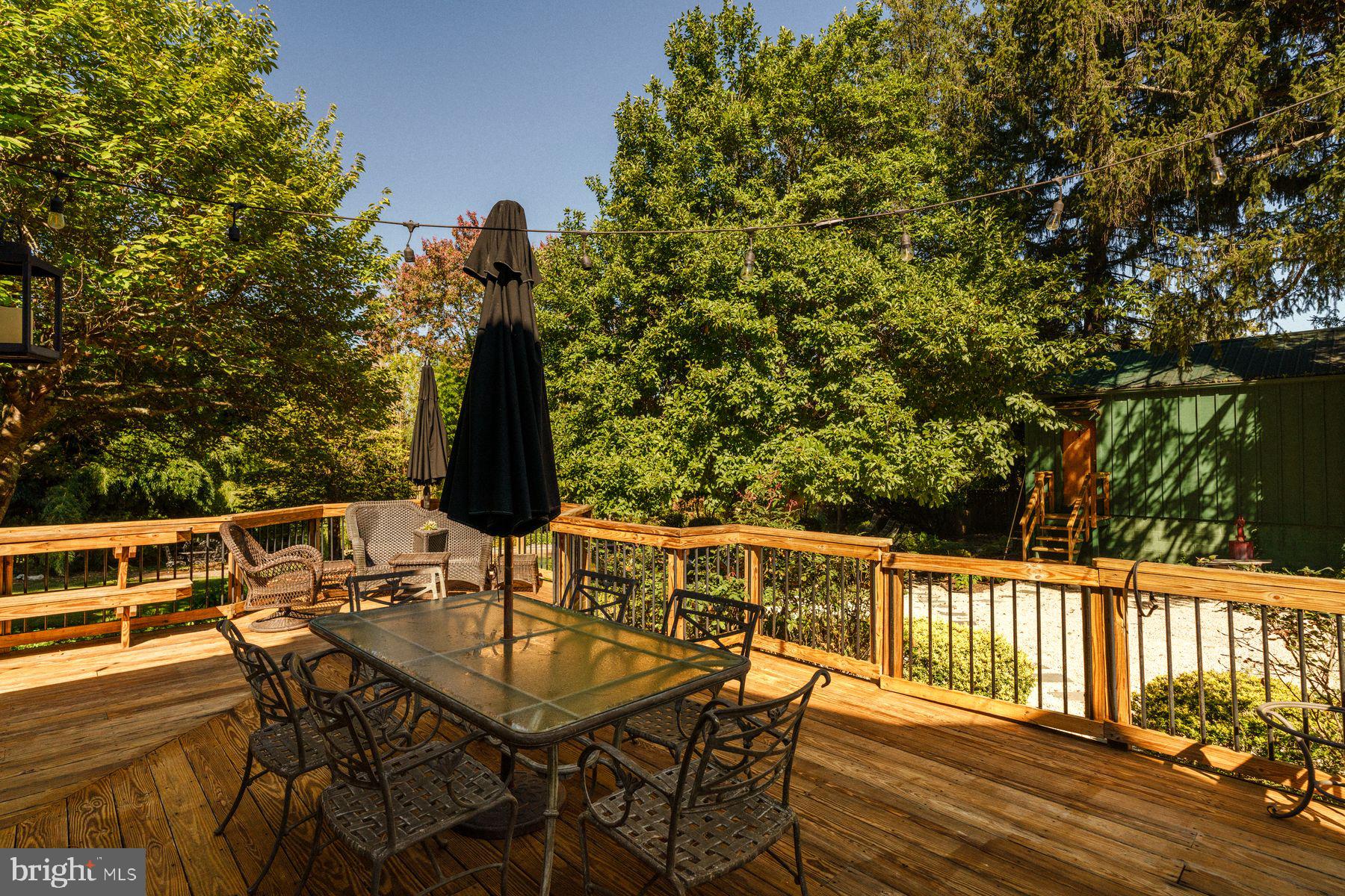 2943 Windy Bush Road Newtown, PA 18940 - Photo 38 of 49 a view of a chairs and table on the deck