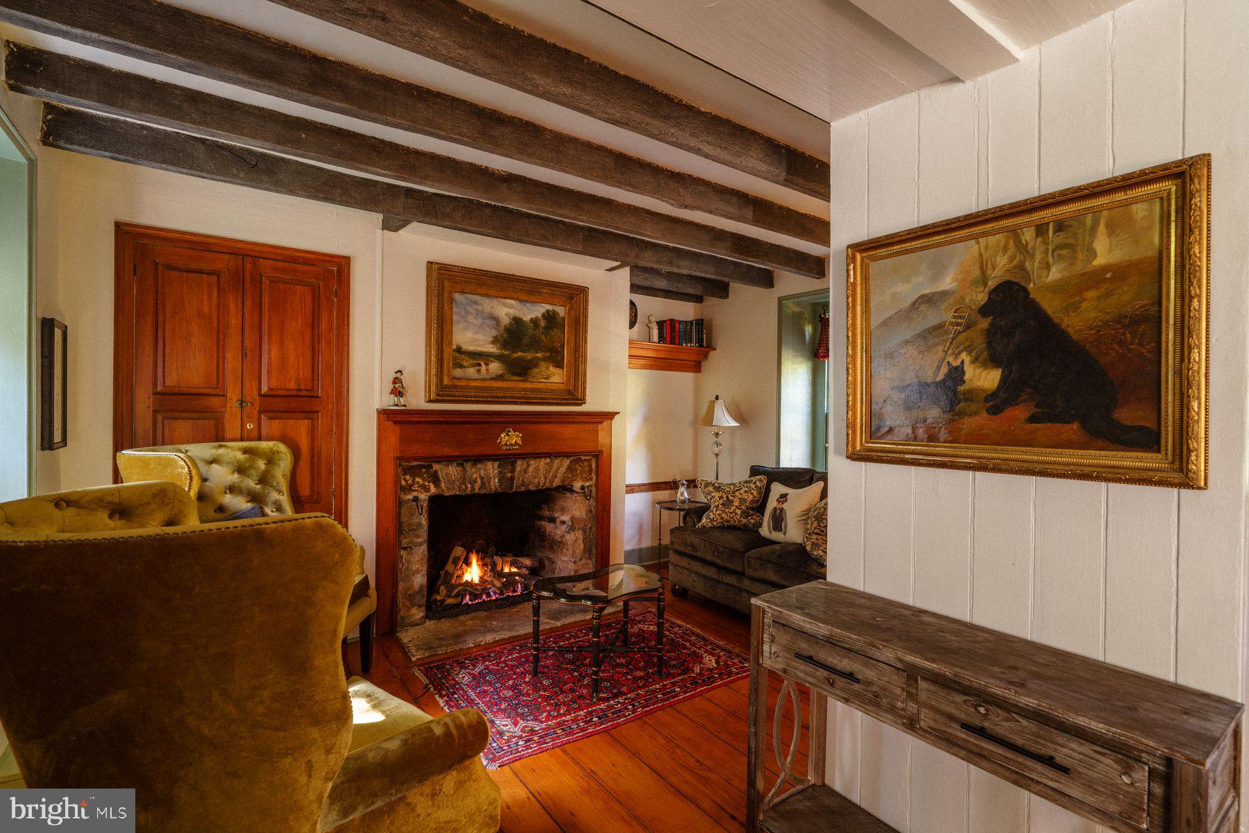 2943 Windy Bush Road Newtown, PA 18940 - Photo 10 of 49 a living room with furniture and a fireplace