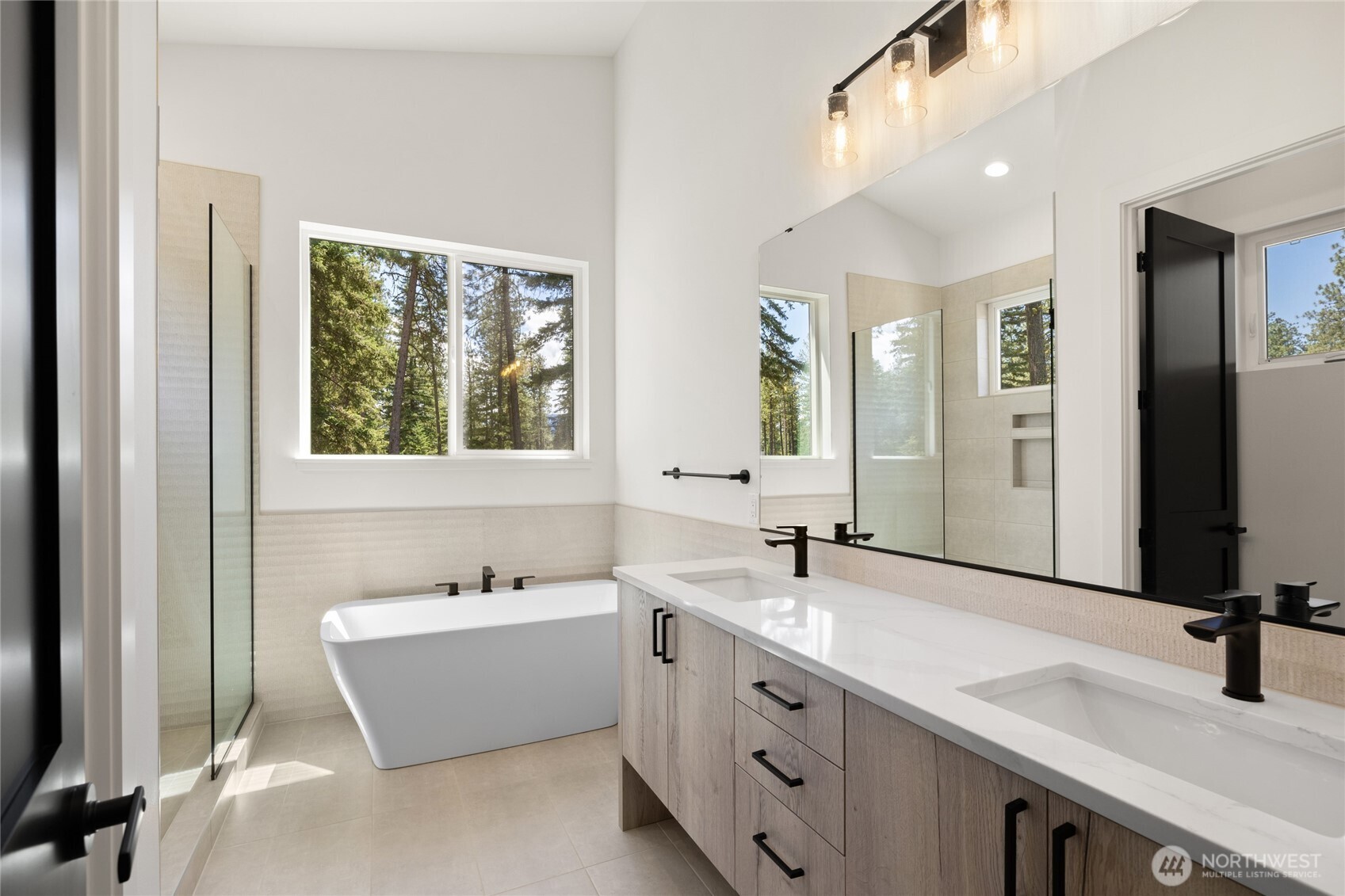 1920 Wanawish Loop Cle Elum, WA 98922 - Photo 11 of 17 a bathroom with a tub double sink and mirror
