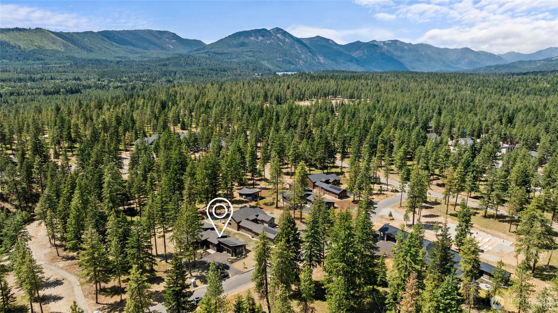 1920 Wanawish Loop Cle Elum, WA 98922 - Photo 16 of 17 a view of a lush green hillside and houses