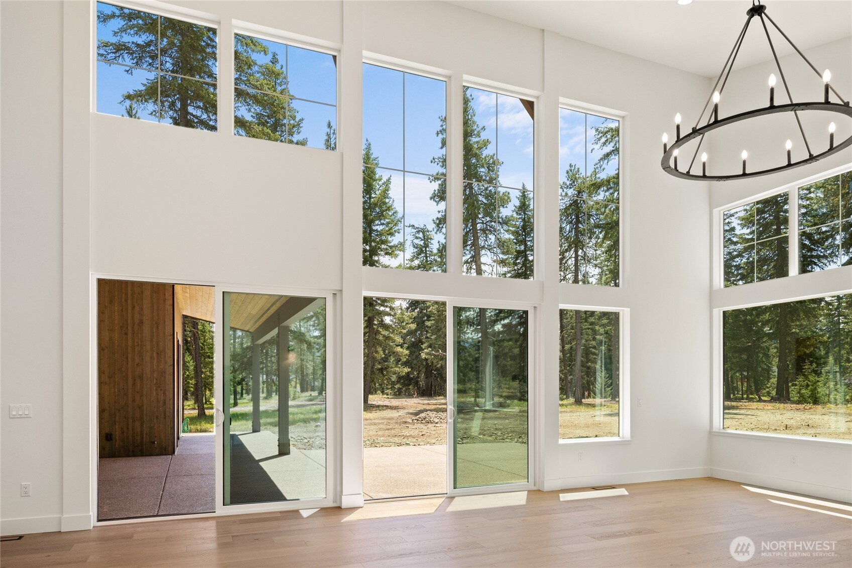 1920 Wanawish Loop Cle Elum, WA 98922 - Photo 6 of 17 a view of an entryway with floor to ceiling windows and yard