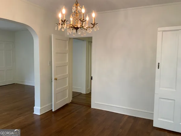 a view of a livingroom with wooden floor