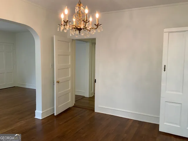 a view of a livingroom with wooden floor