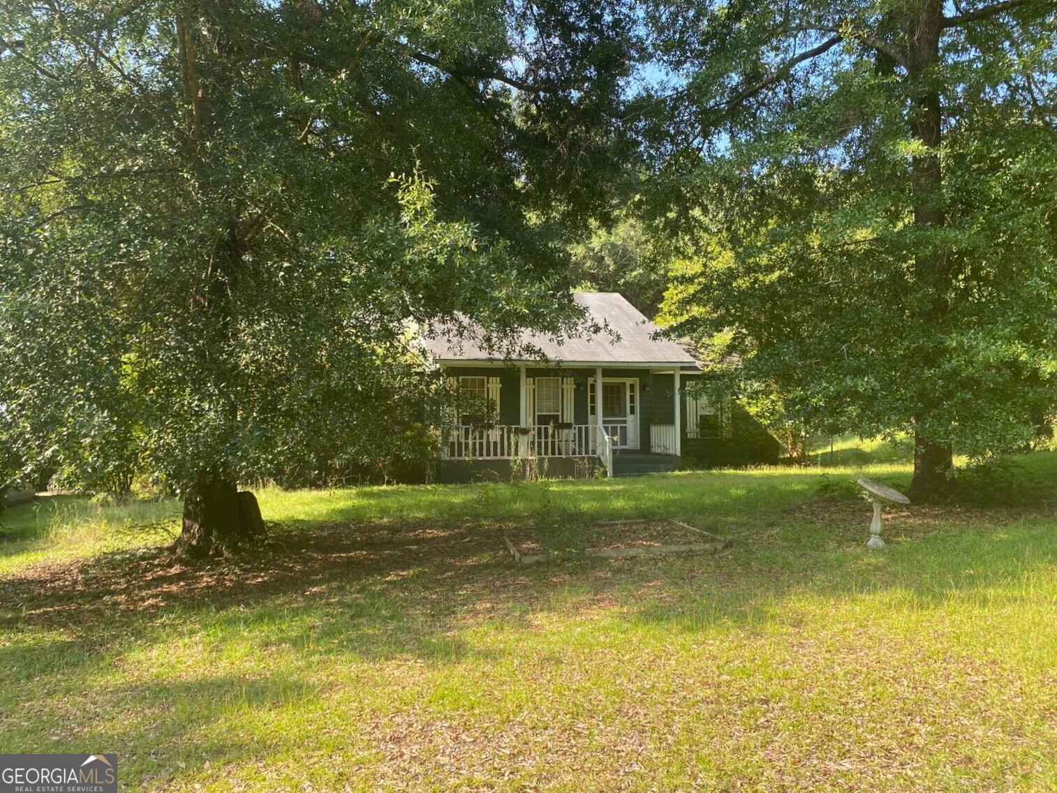 a view of a house with a yard balcony