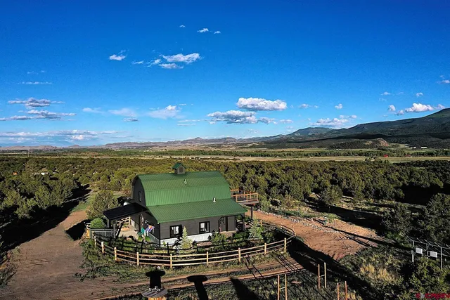 a view of a balcony with an ocean