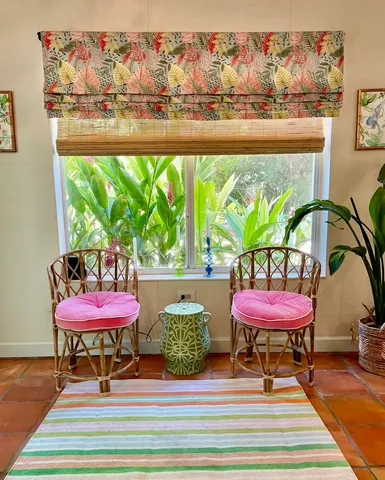 a view of a room with a table and a chair