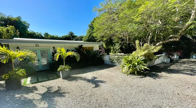 a front view of a garden with patio