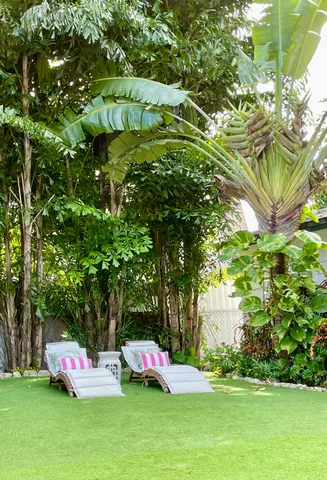 a group of cars parked in front of yard