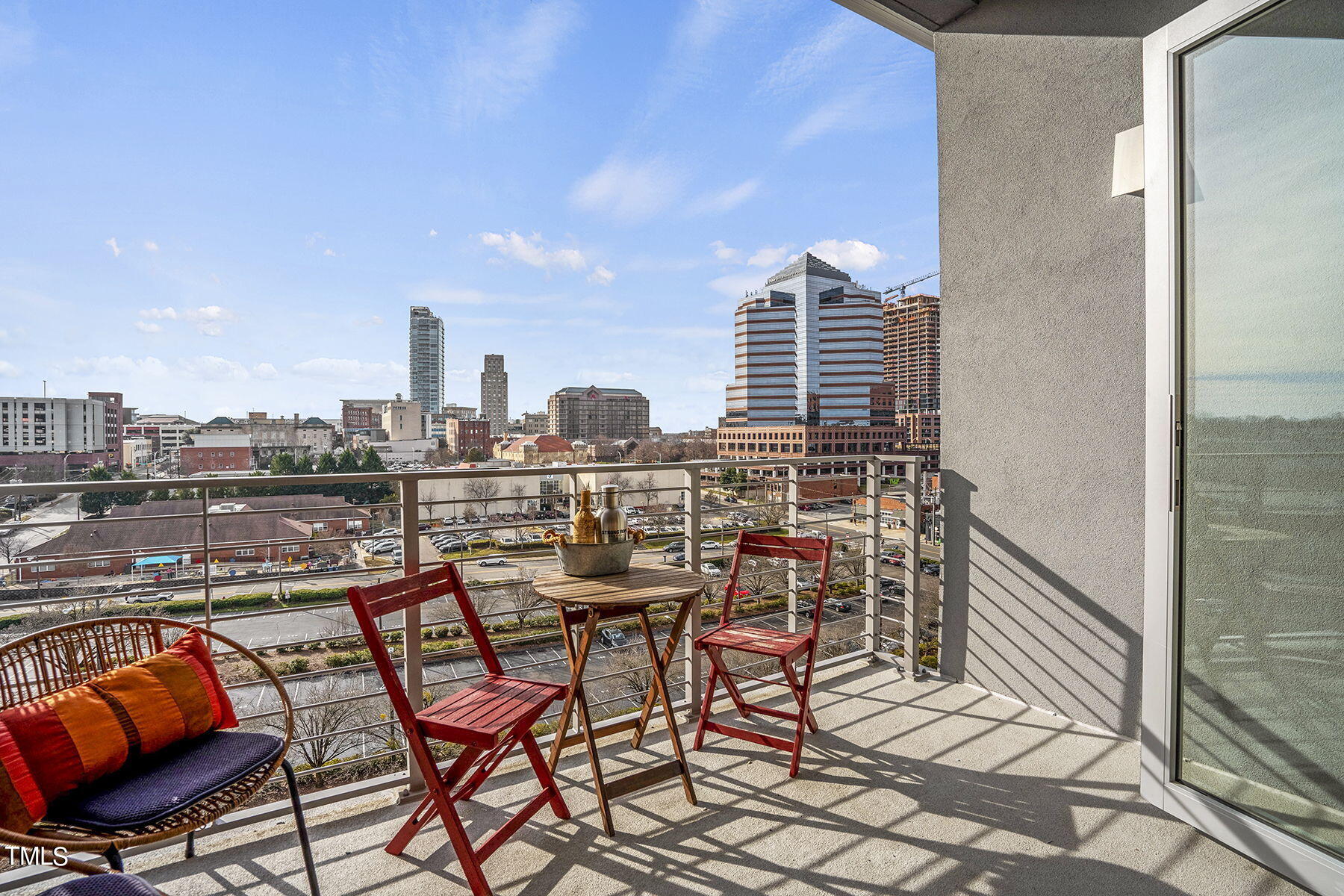 214 Hunt Street, Unit 711 Durham, NC 27701 - Photo 19 of 29 a view of a city from a lounge chair