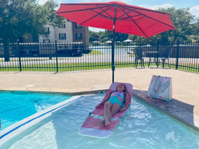 a view of a backyard with a sitting space