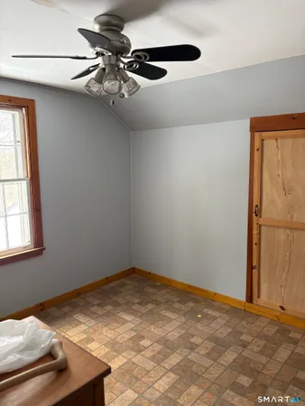 a view of a room with a dishwasher and a window