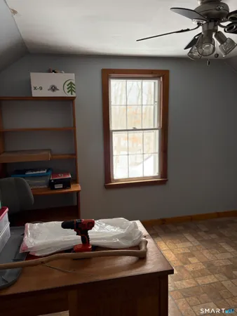 a room with furniture and window