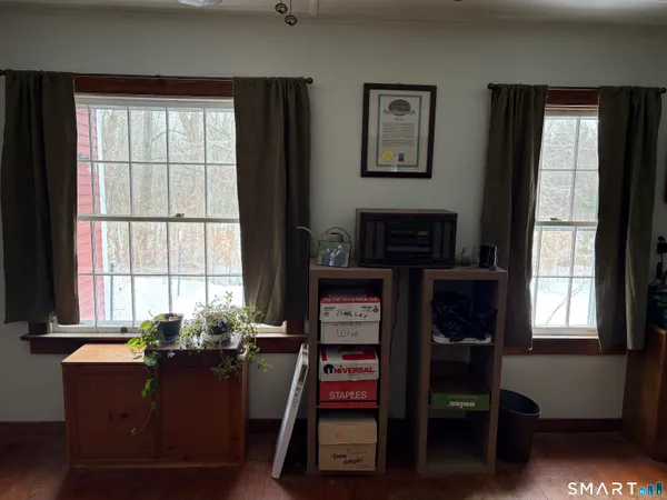 a room with furniture and a window