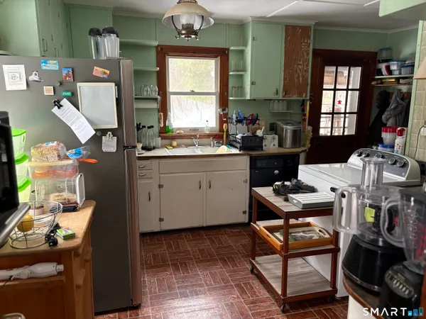 a workspace with furniture and window