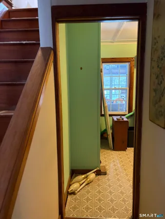 a view of a living room with a large window