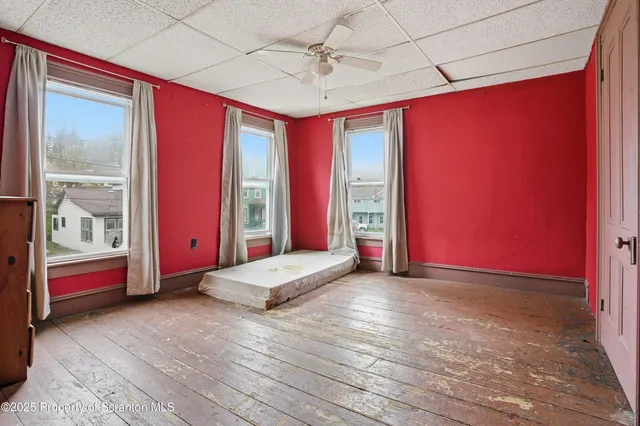 a view of an empty room with window