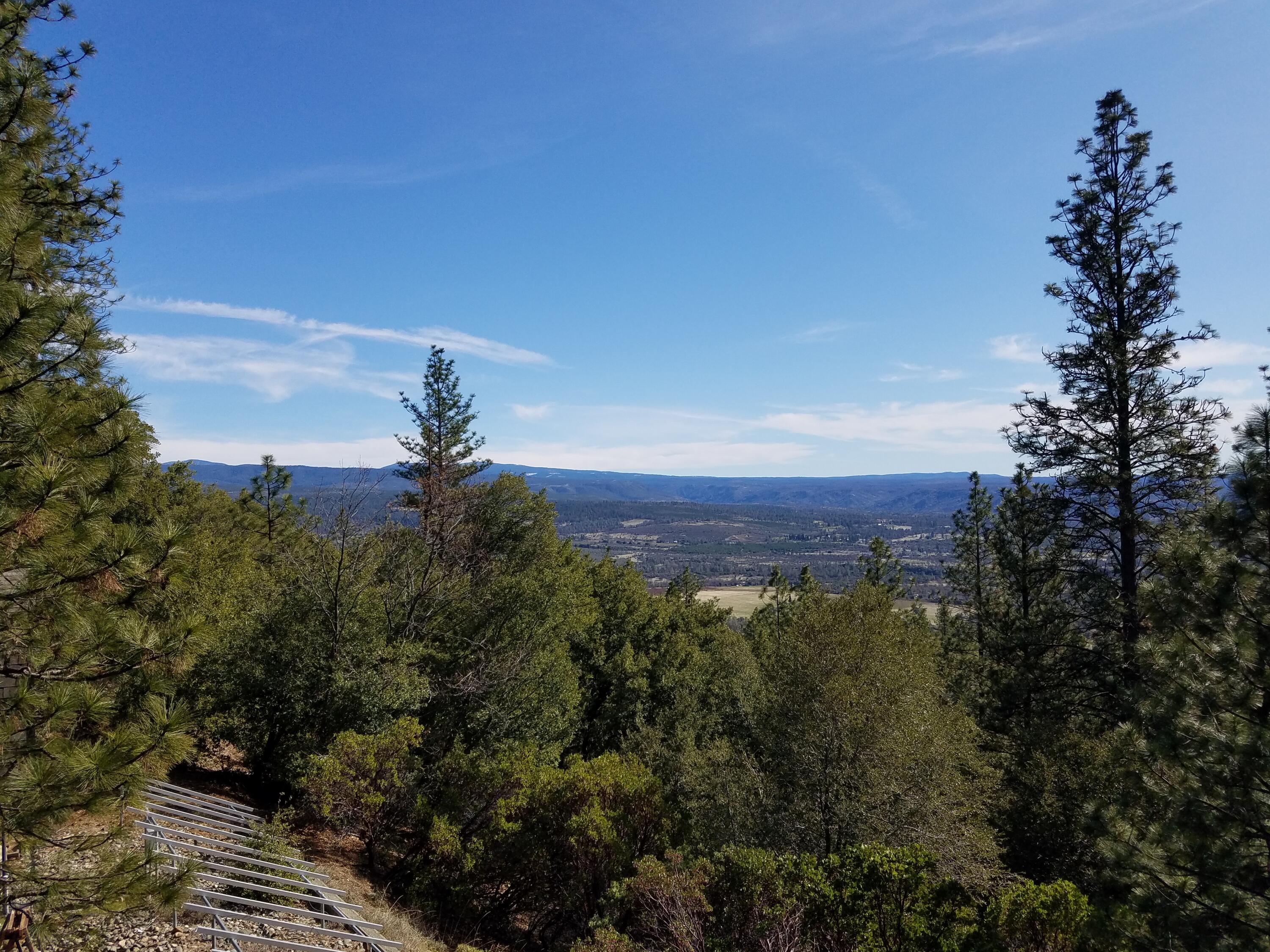 6200 Wilson Hill Road Shingletown, CA 96088 - Photo 13 of 53 a view of a city with lush green forest