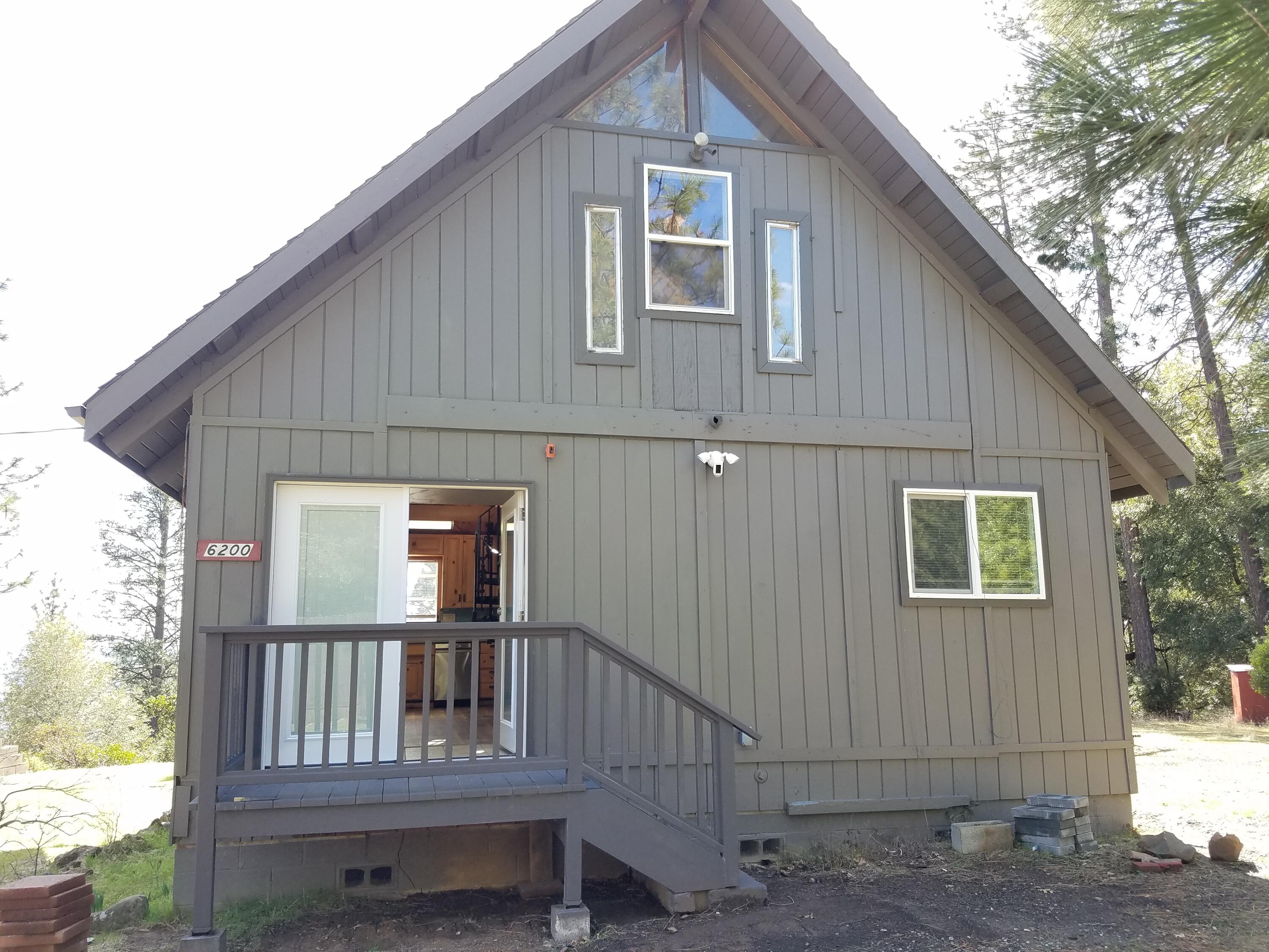 6200 Wilson Hill Road Shingletown, CA 96088 - Photo 2 of 53 a view of backyard with deck and outdoor seating