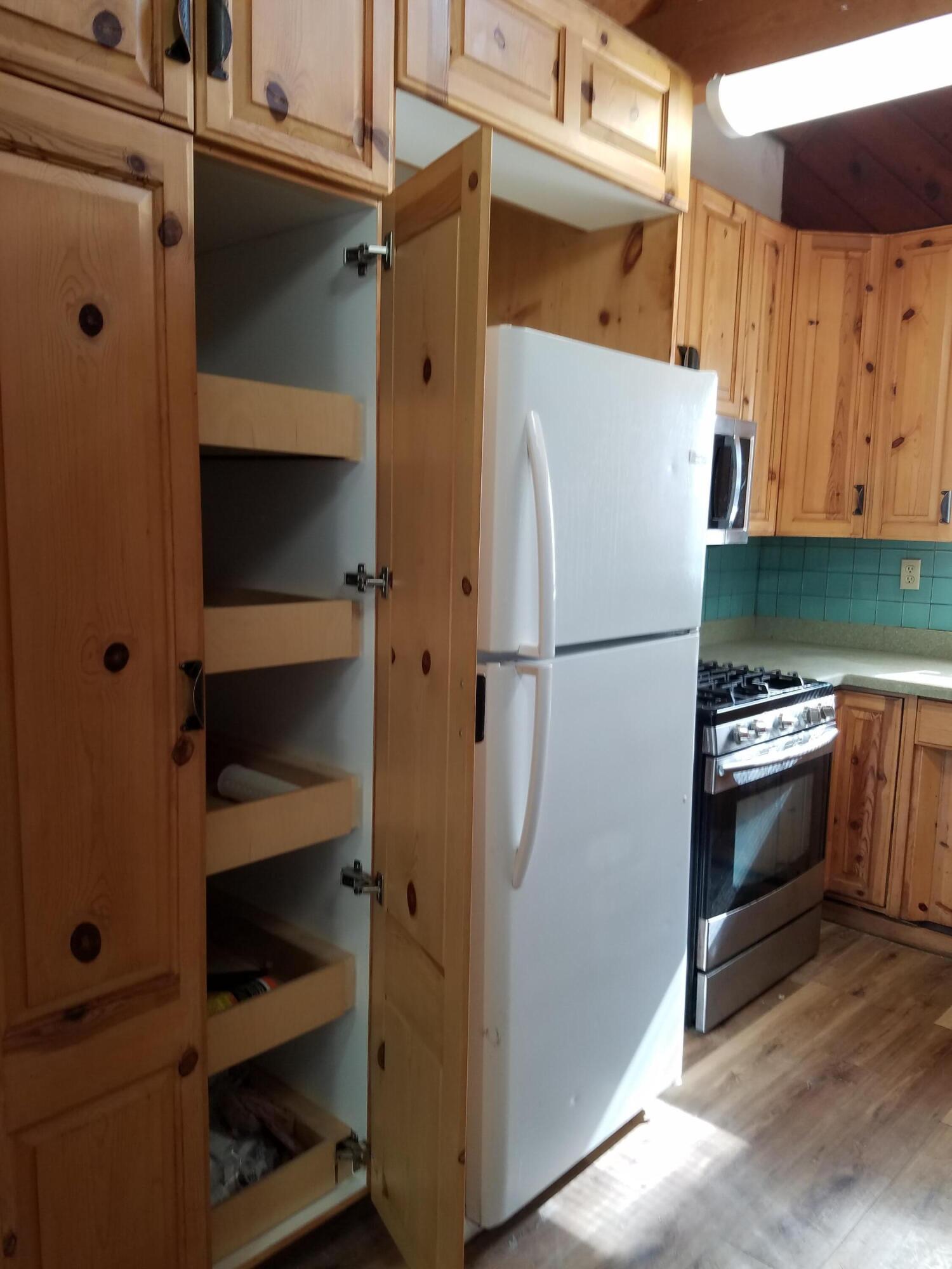 6200 Wilson Hill Road Shingletown, CA 96088 - Photo 24 of 53 a kitchen with a refrigerator and a stove