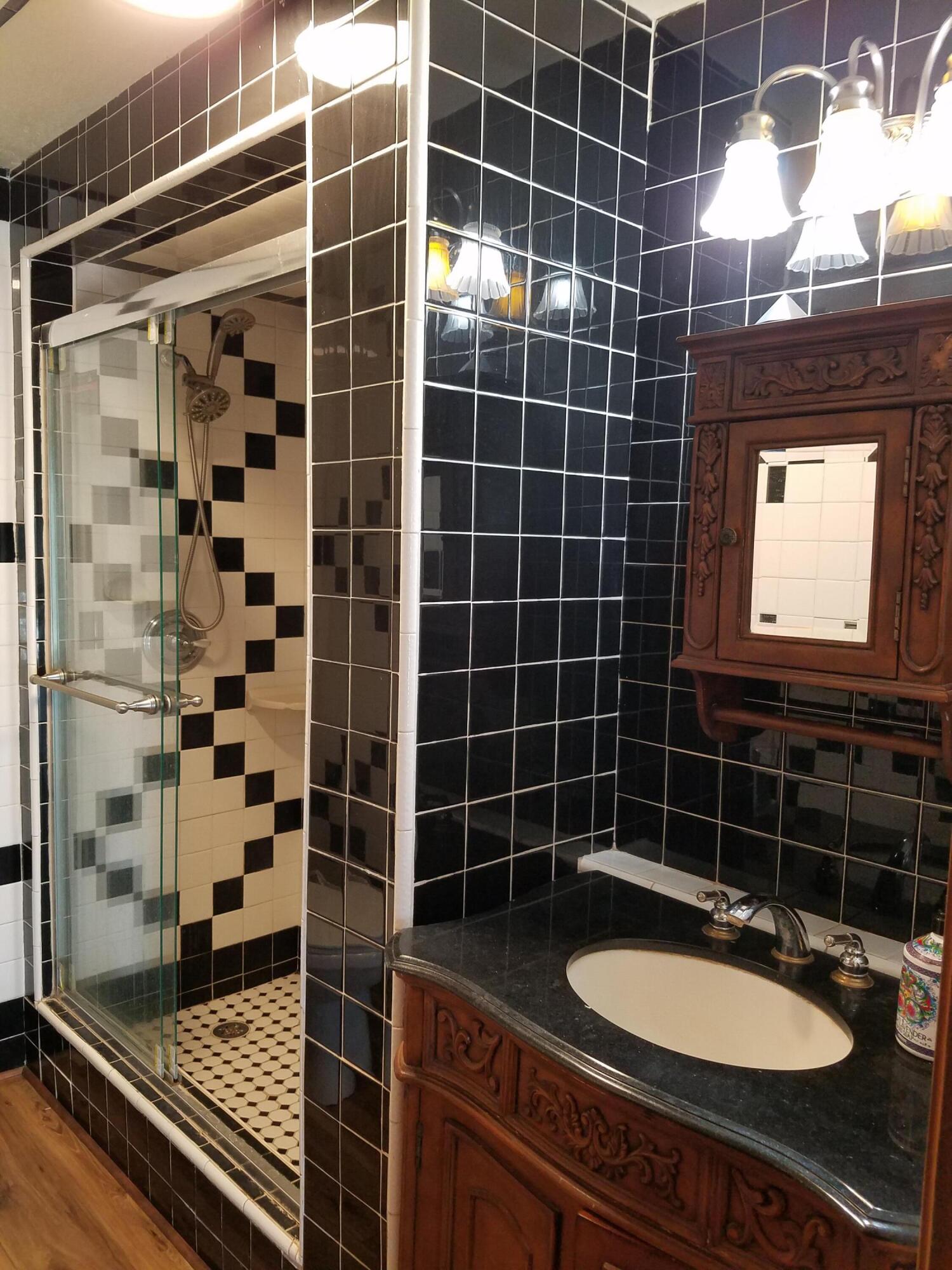 6200 Wilson Hill Road Shingletown, CA 96088 - Photo 28 of 53 a bathroom with a sink toilet shower and mirror