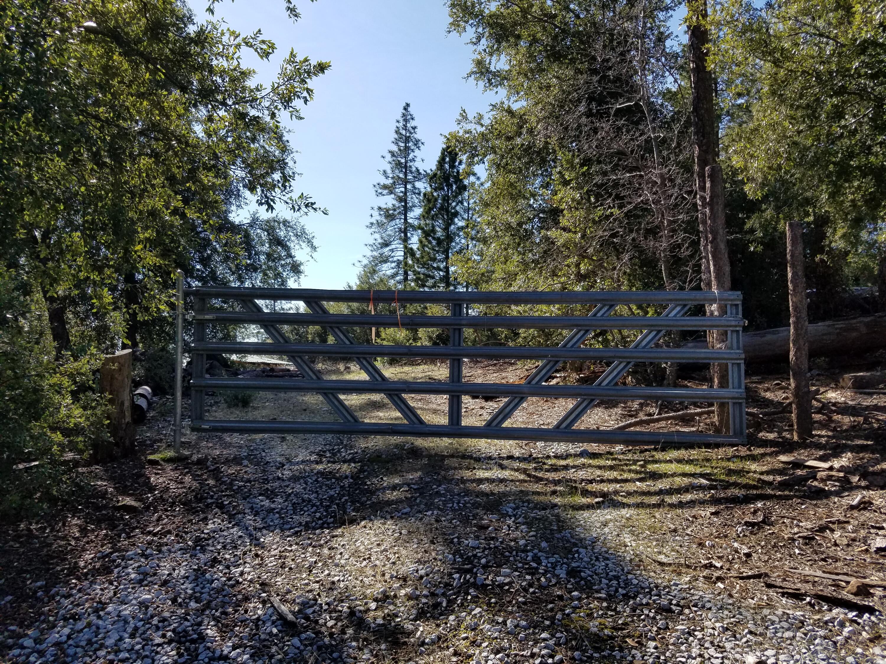 6200 Wilson Hill Road Shingletown, CA 96088 - Photo 44 of 53 a view of a yard with wooden fence
