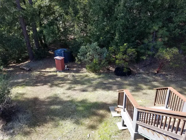 a view of a swimming pool with chairs