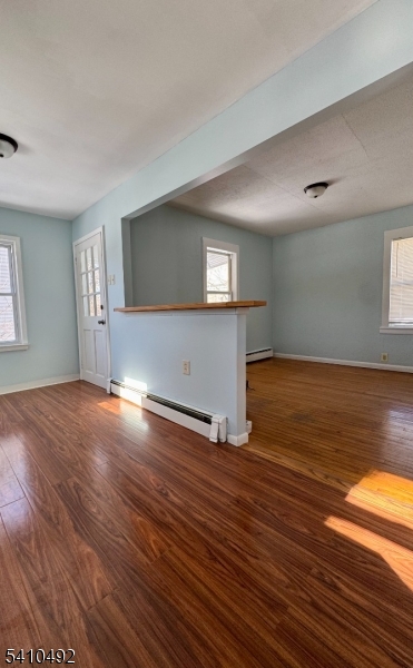 14 Glen Road Sparta, NJ 07871 - Photo 7 of 13 a view of empty room with wooden floor