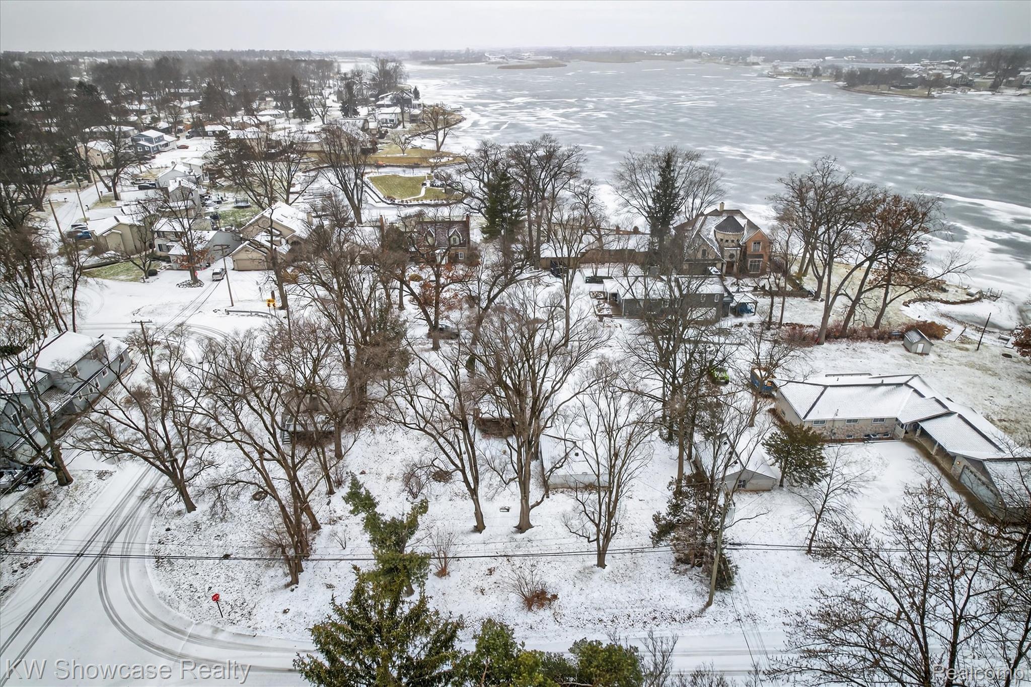 1860 Ladd Road Walled Lake, MI 48390 - Photo 43 of 48 Snowy aerial view with a residential view
