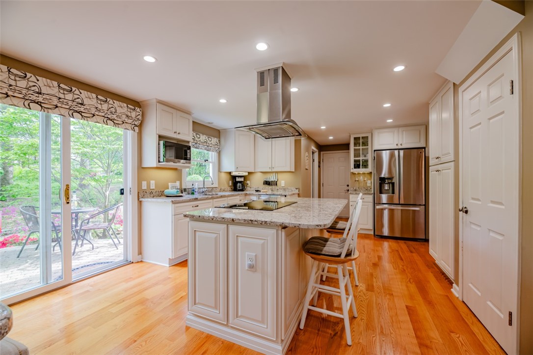 77 Misty Pine Road Perinton, NY 14450 - Photo 17 of 47 THE SLIDING GLASS DOORS CONVENIENTLY GO FROM THE K