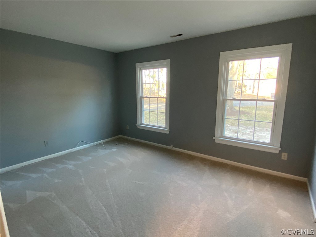 5707 Linda Road Sandston, VA 23150 - Photo 11 of 14 1st floor bedroom with two windows.