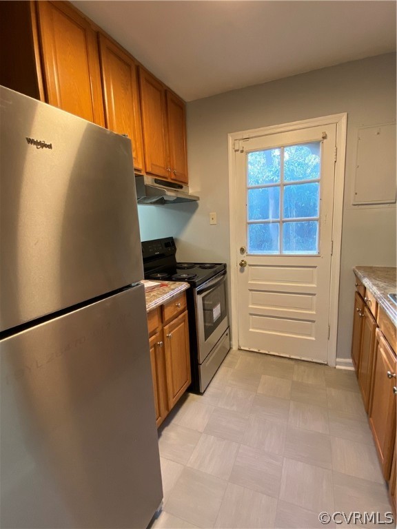 5707 Linda Road Sandston, VA 23150 - Photo 6 of 14 Galley style kitchen opens to patio