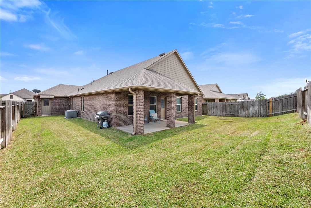 2018 Eagle View Drive Navasota, TX 77868 - Photo 24 of 28 a view of a house with a yard