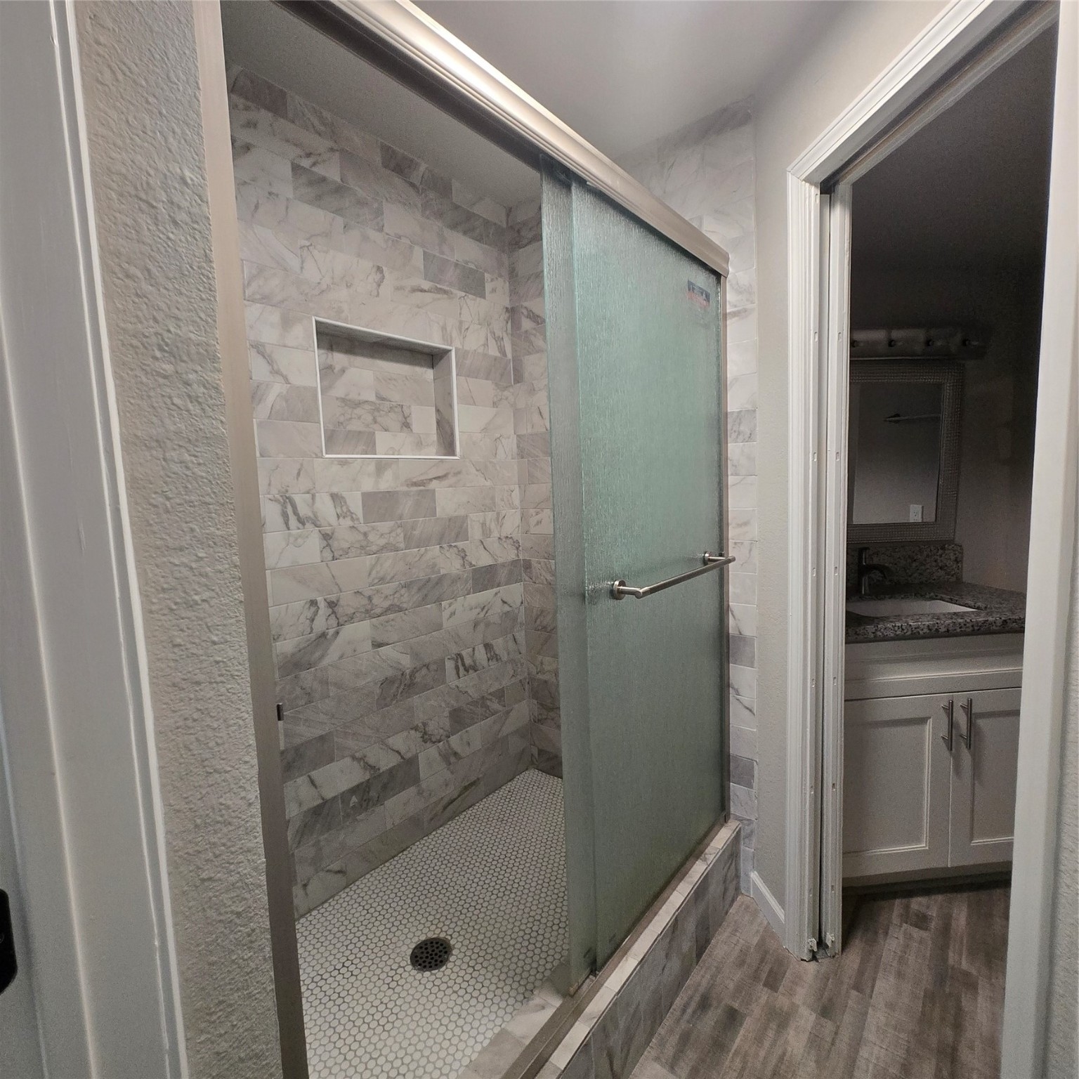 8355 Nairn Street Houston, TX 77074 - Photo 12 of 21 a bathroom with a shower