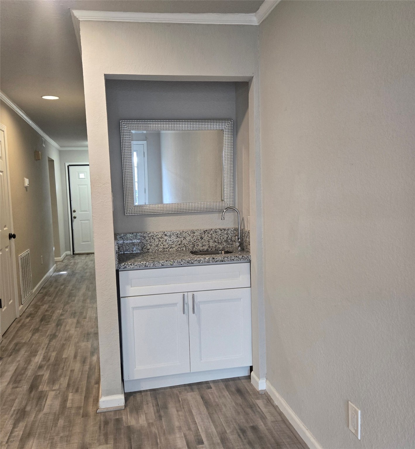 8355 Nairn Street Houston, TX 77074 - Photo 5 of 21 a bathroom with a sink and a mirror