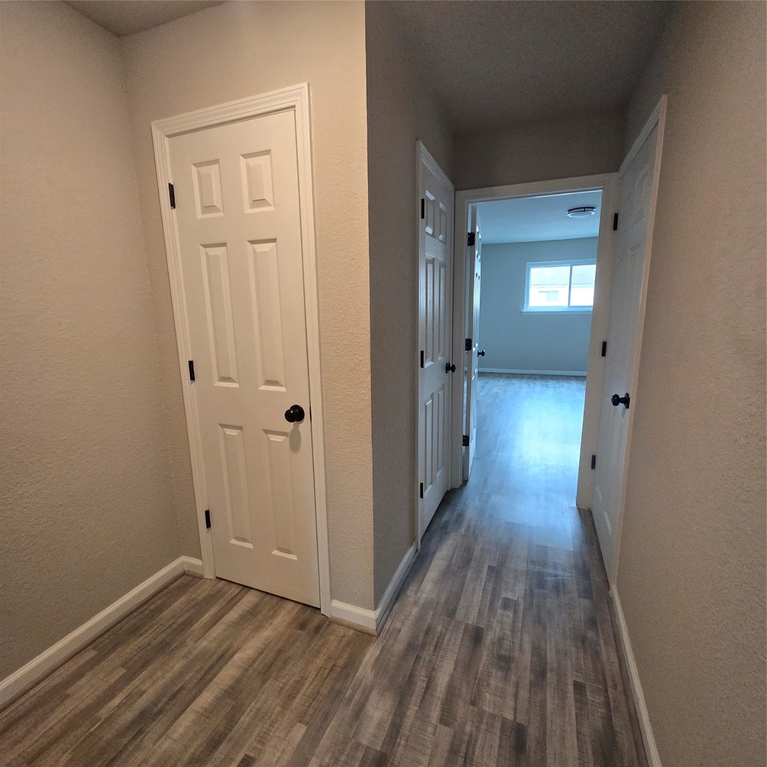 8355 Nairn Street Houston, TX 77074 - Photo 6 of 21 a view of a room with wooden floor