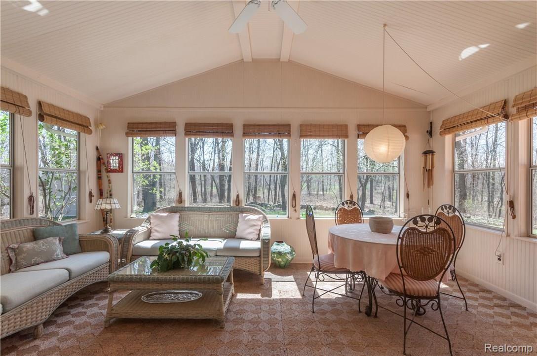 3747 Ray Road Oxford, MI 48370 - Photo 25 of 49 Come relax in this custom Sunroom/Florida Room with gorgeous views of the nature and wildlife!