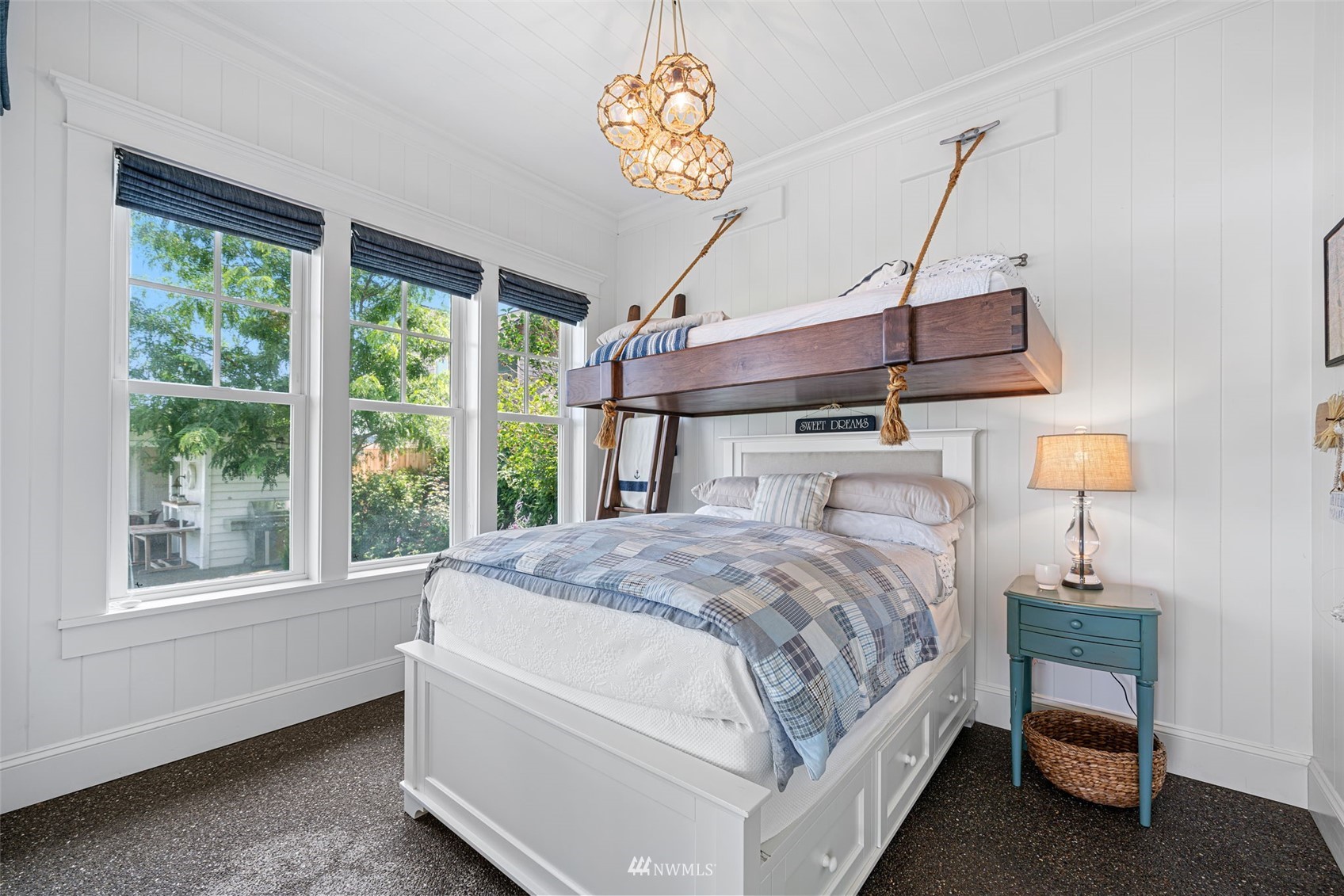 6797 Northeast North Shore Road Belfair, WA 98528 - Photo 12 of 40 a bedroom with a bed and a window