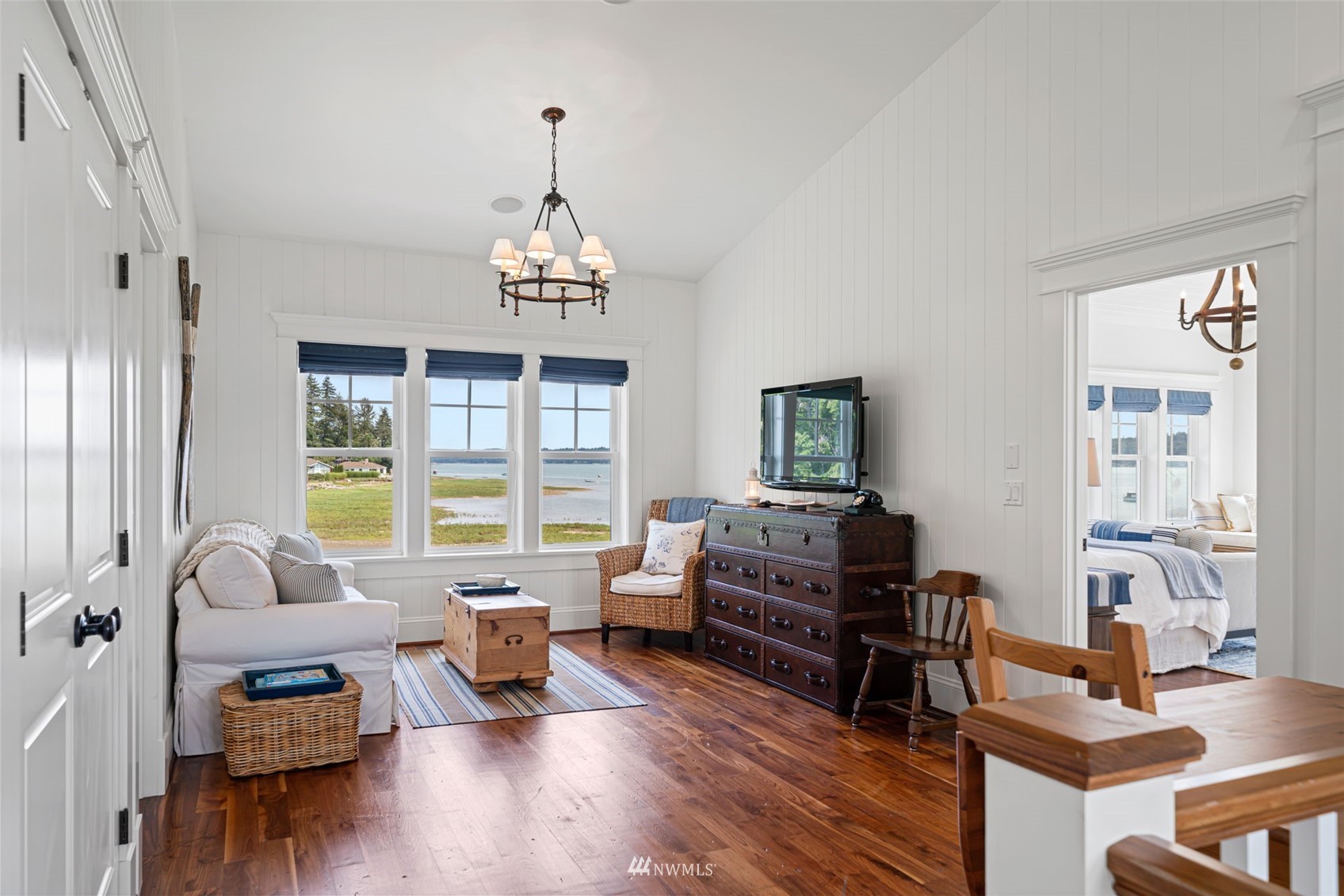 6797 Northeast North Shore Road Belfair, WA 98528 - Photo 16 of 40 a living room with furniture or couch and a wooden floor