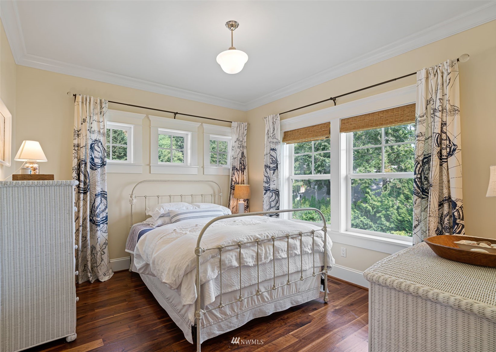 6797 Northeast North Shore Road Belfair, WA 98528 - Photo 19 of 40 a bedroom with a bed and a large window