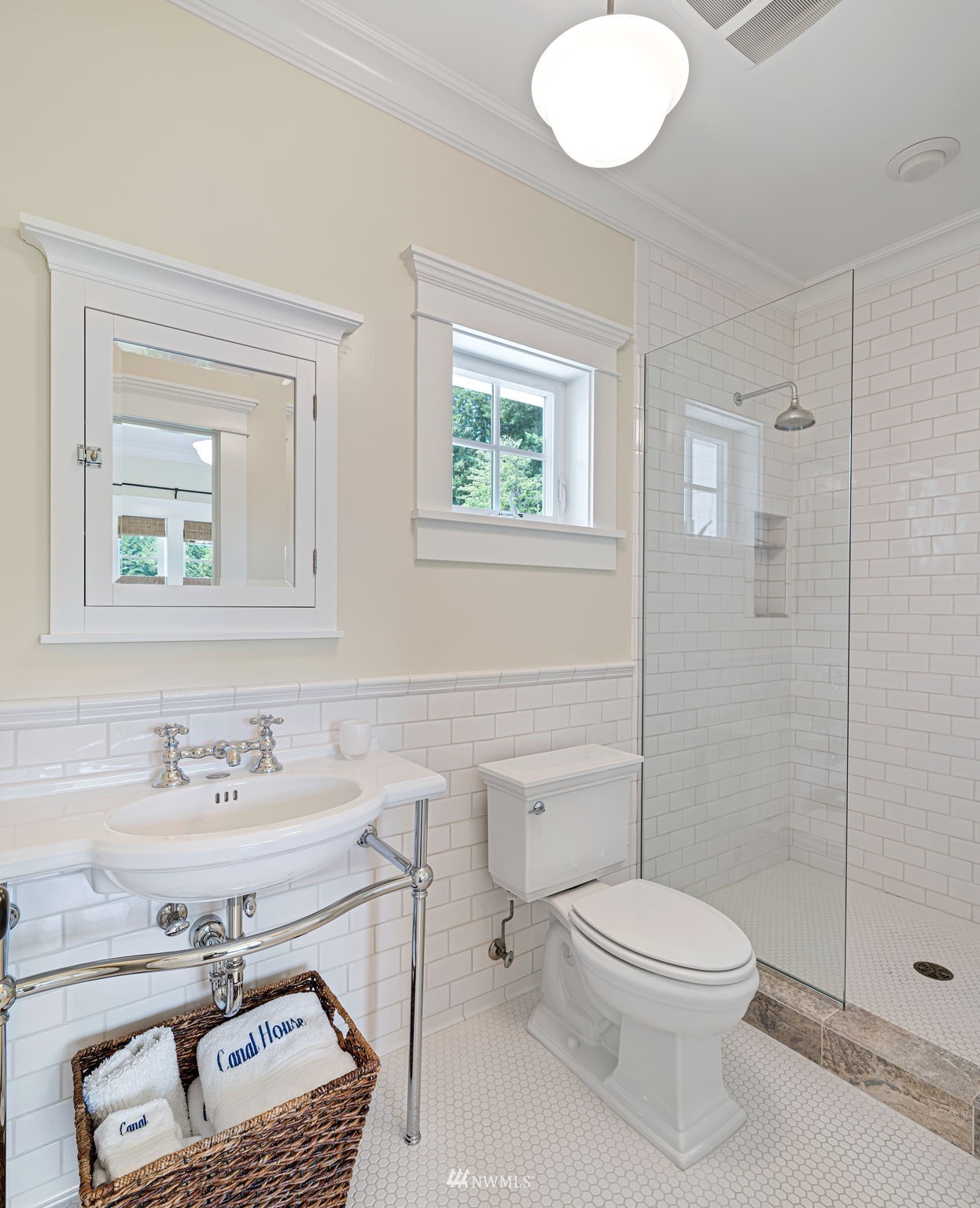 6797 Northeast North Shore Road Belfair, WA 98528 - Photo 21 of 40 a bathroom with a sink toilet and shower