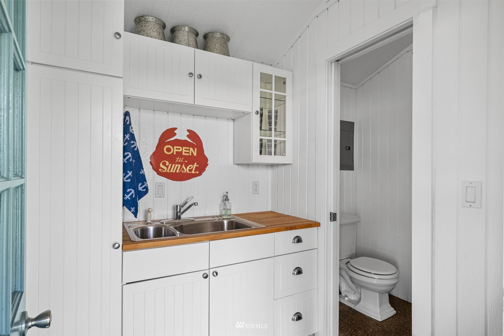 6797 Northeast North Shore Road Belfair, WA 98528 - Photo 24 of 40 a bathroom with a sink and a toilet