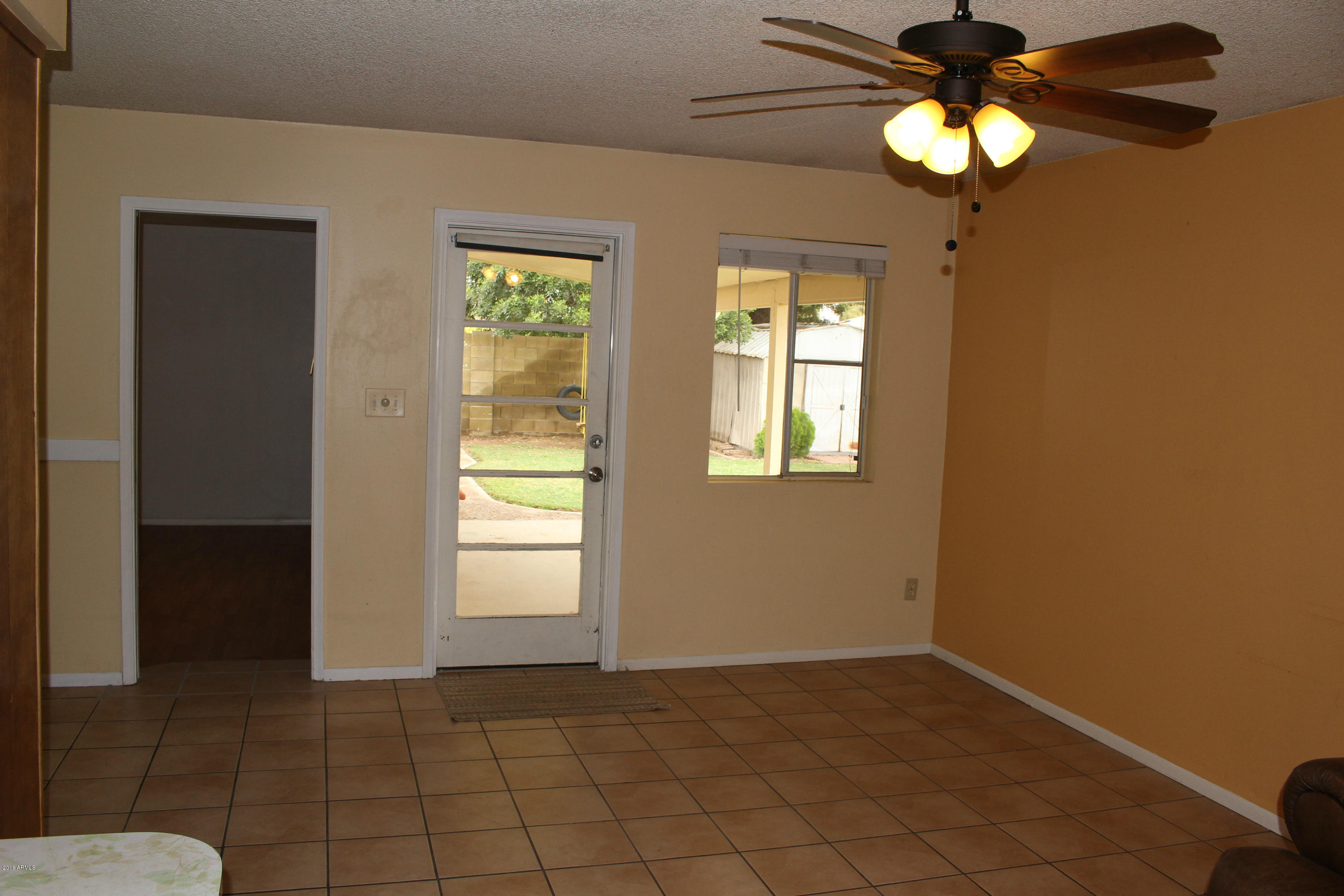 4101 West Hatcher Road Phoenix, AZ 85051 - Photo 9 of 16 4101 W Hatcher Rd Family Room 2