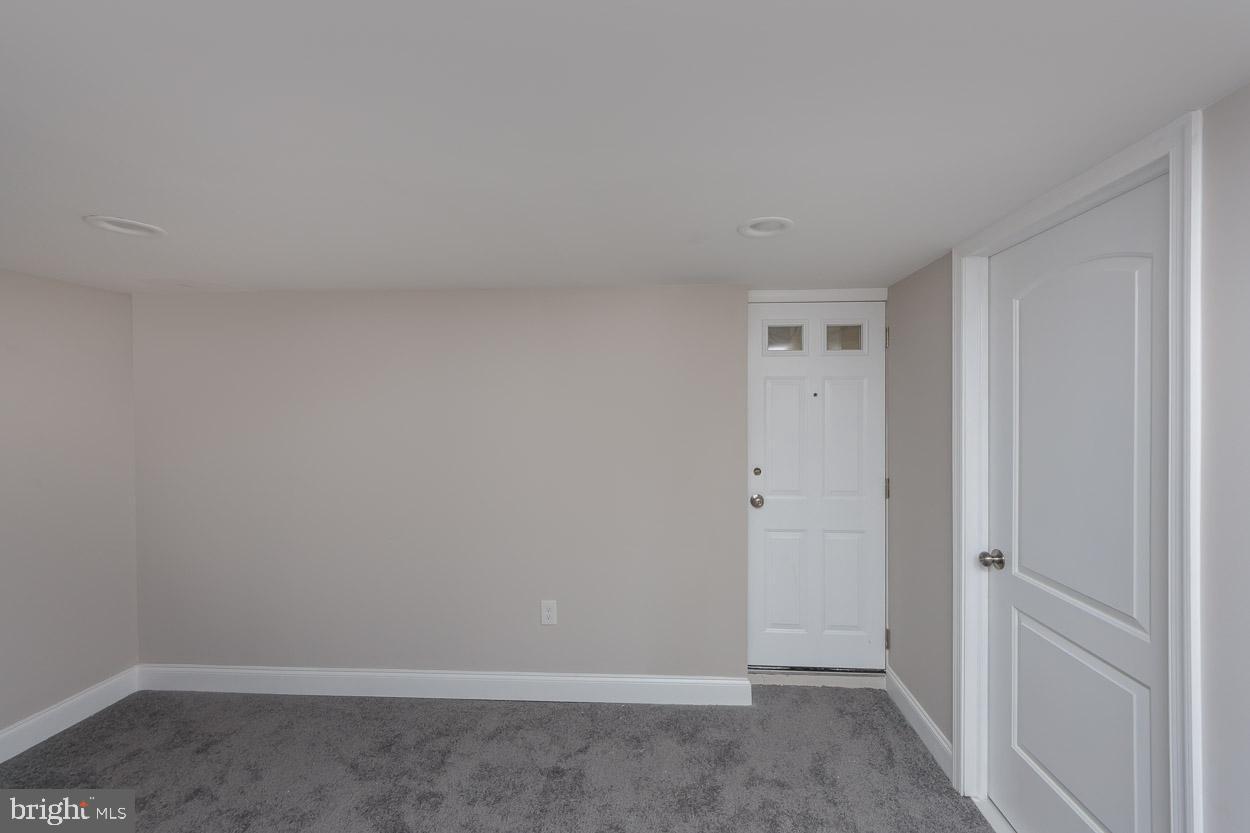 5923 Falkirk Road Baltimore, MD 21239 - Photo 24 of 27 a view of an empty room