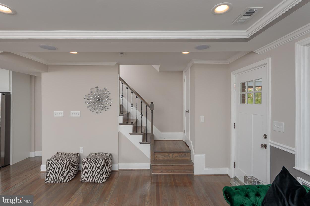 5923 Falkirk Road Baltimore, MD 21239 - Photo 4 of 27 a view of entryway and hall with wooden floor