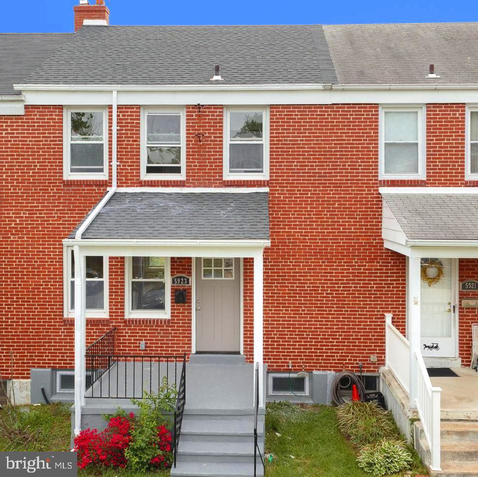 5923 Falkirk Road Baltimore, MD 21239 - Photo 5 of 27 a front view of a house with garden