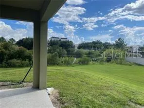 a view of a park with welcome board