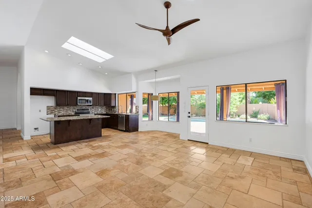 a bed room with a bed and a potted plant