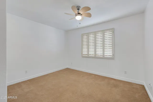 a view of a workspace with furniture