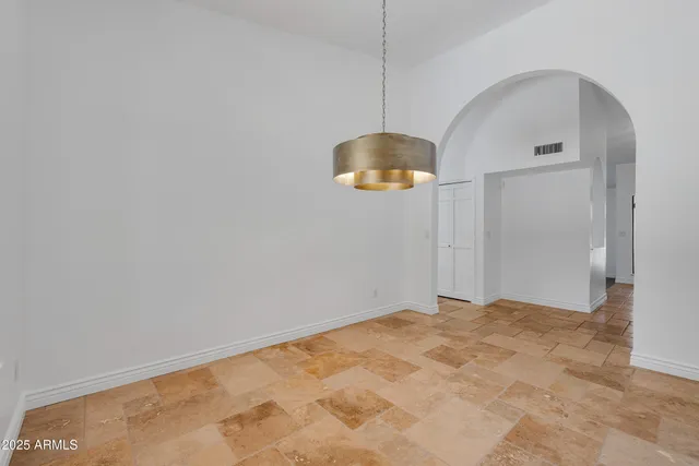 a view of a workspace with furniture