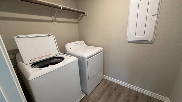 a utility room with dryer and washer
